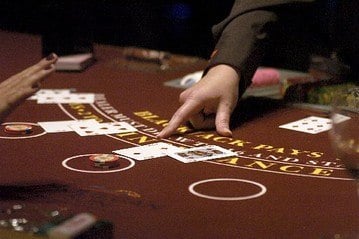 Mohegan Sun Blackjack Dealer Accused of Chip-Passing Scam