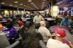 Las Vegas Poker Players, Frequently Unmasked, Gradually Return to Tables